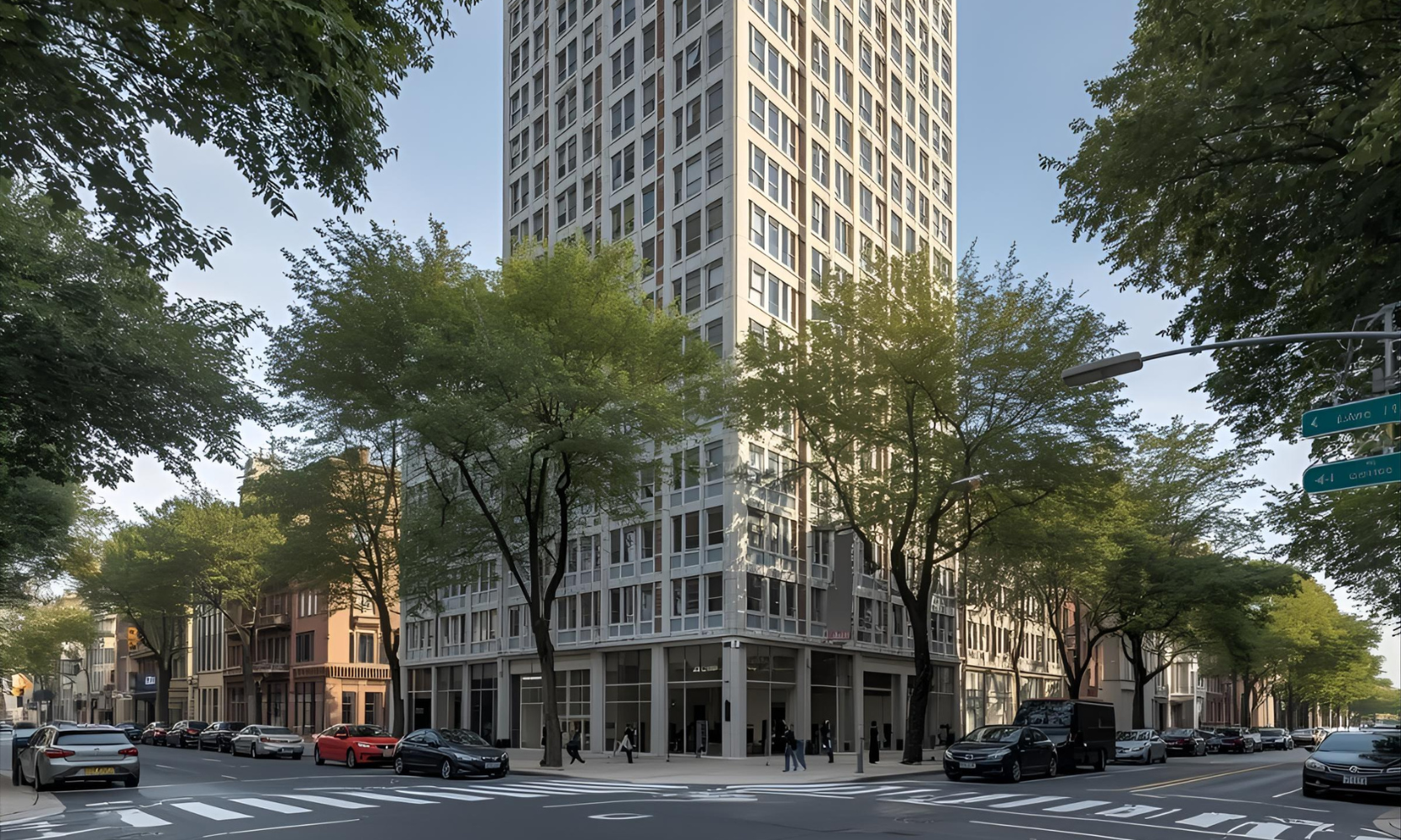 Street view image of a white high-rise apartment building with cars parked around it