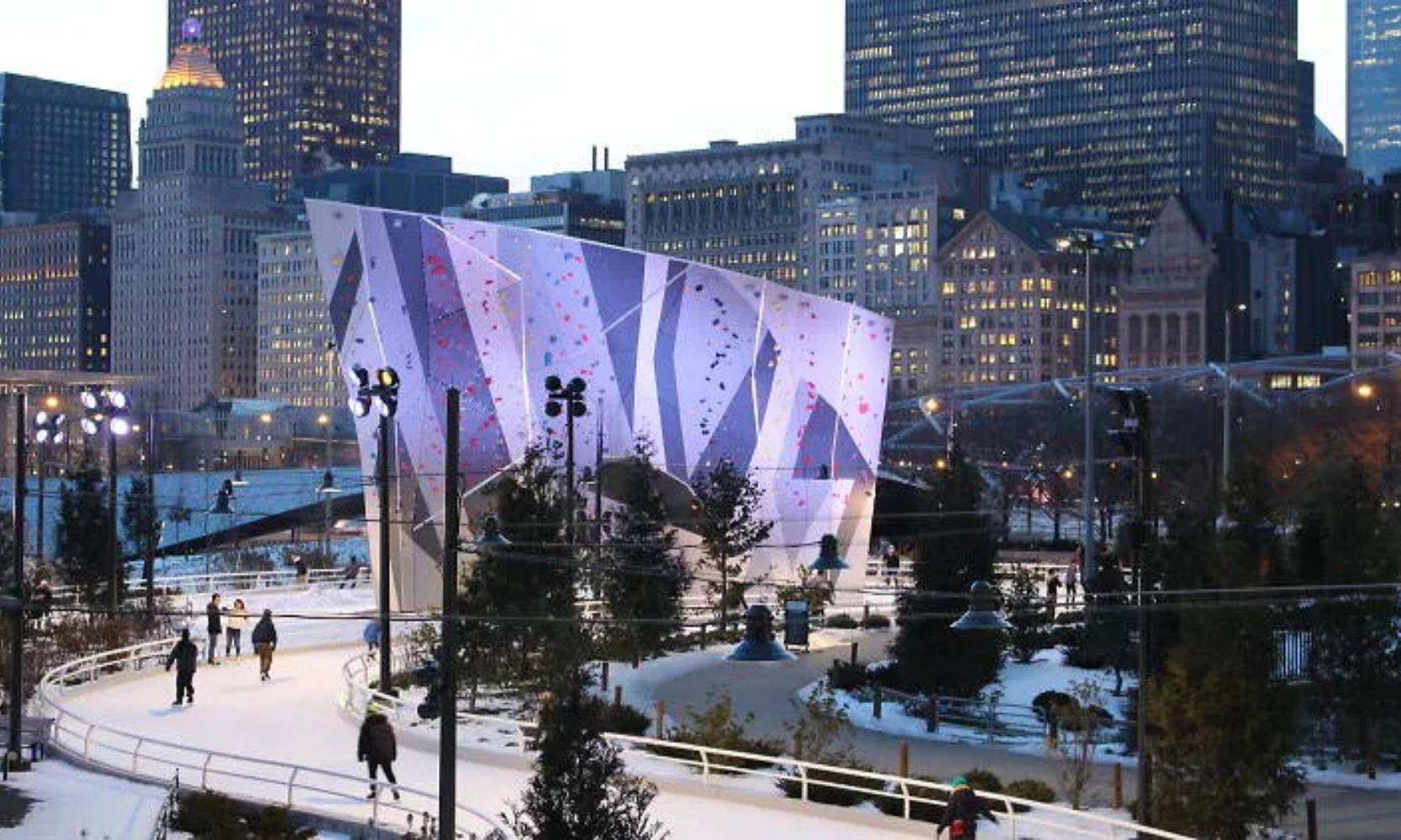 Image of the ice skating ribbon at Maggie Daley Park with people ice skating in Chicago