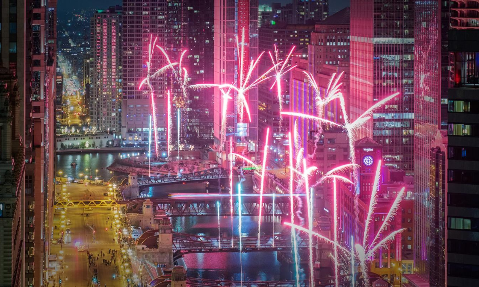Image of the Chicago New Year's fireworks over the Chicago River