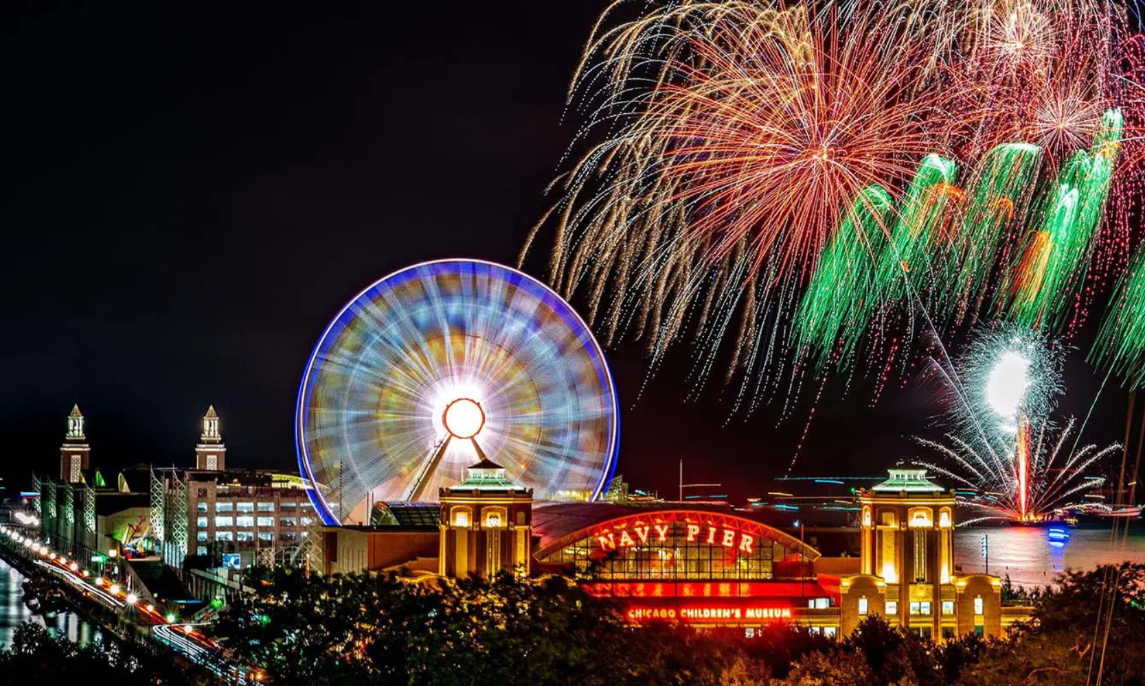 Image of Chicago New Year's fireworks over Navy Pier and the Centennial Ferris wheel